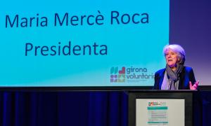 La Presidenta de Girona Voluntària donant la benvinguda